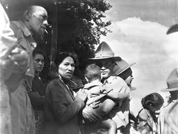 Māori reinforcements farewelling women and children.