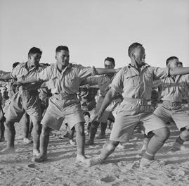 Māori Battalion performing a haka, probably in Egypt.